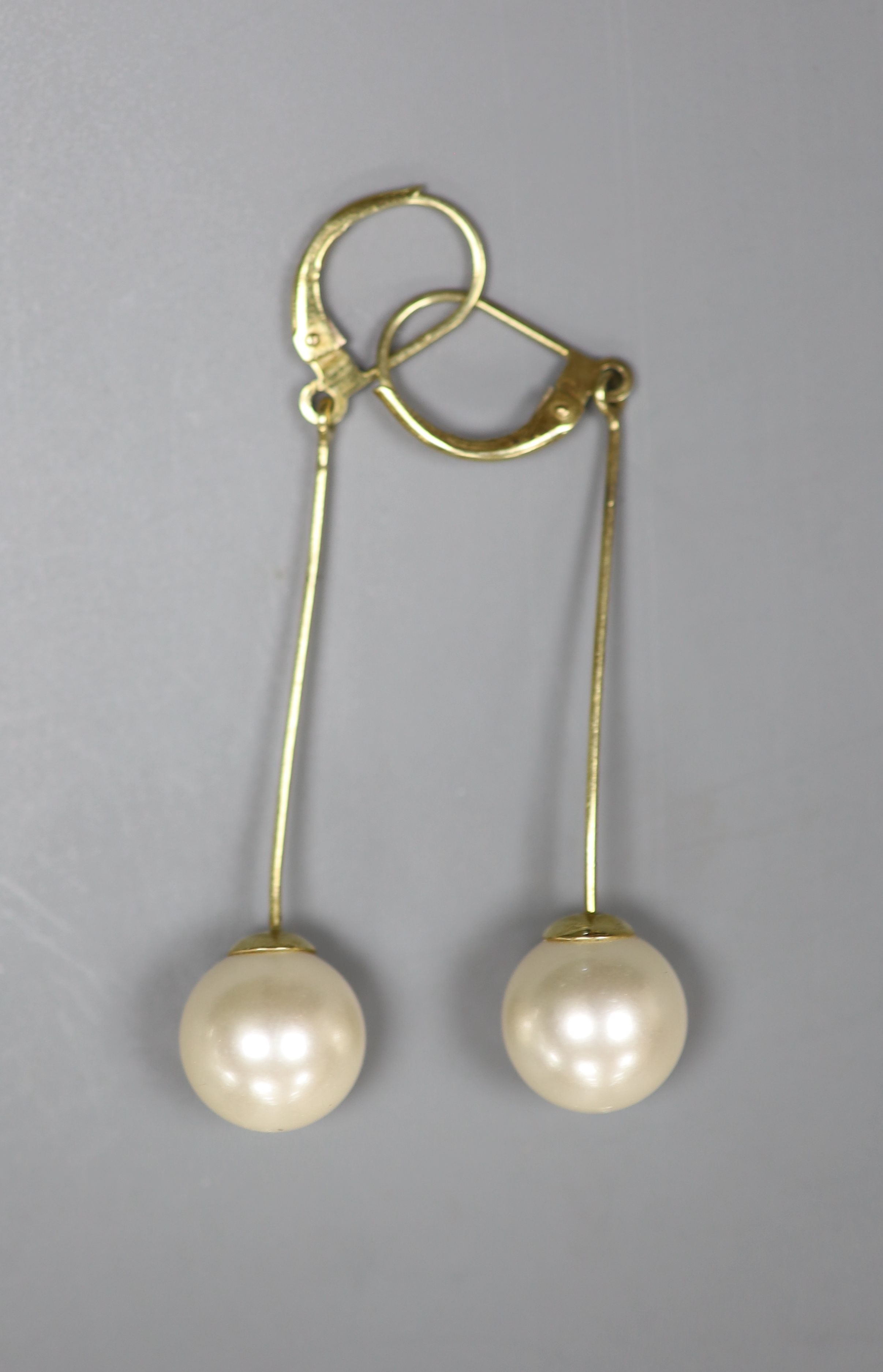 A pair of mid 20th century 585 yellow metal and simulated pearl set bar drop earrings